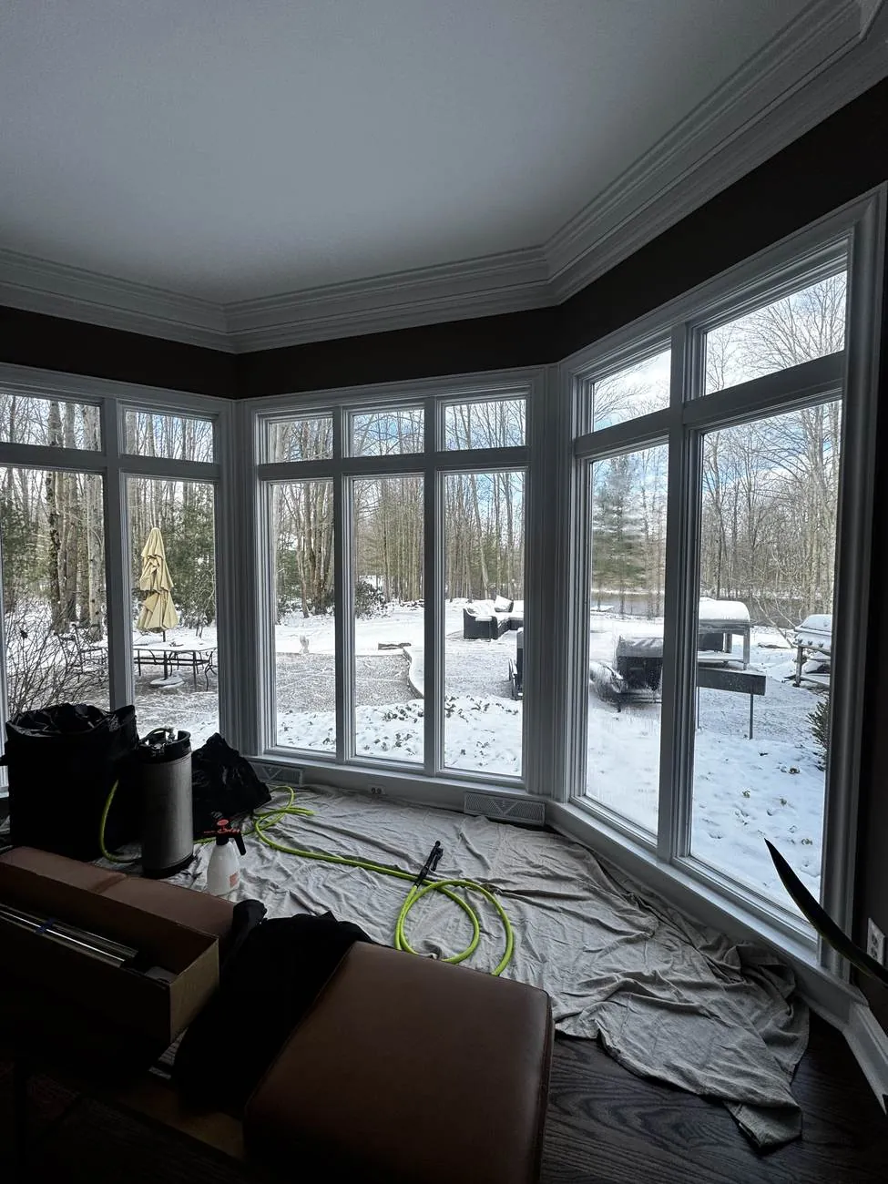 A-frame home with a full glass gable wall treated with solar window film in Northeast Ohio