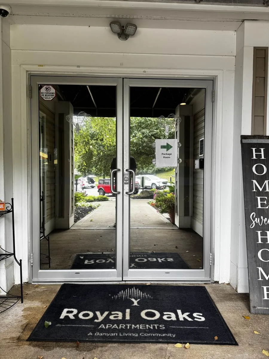 Commercial glass entrance doors protected with security window film